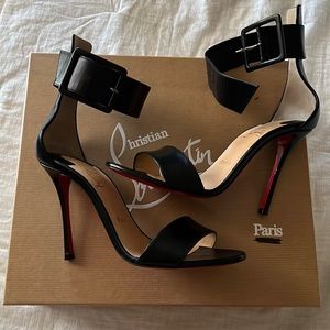 Christian Louboutins black cuff sandal heels
